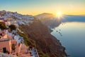 Santorini, Greece. Sunrise on the famous island of Santorini, view of the city of Oia. The sun rises and illuminates the Royalty Free Stock Photo