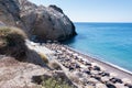 View from above of a beach with sun-beds and umbrellas at Santorini, Greece Royalty Free Stock Photo