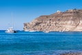 Boat on the aegean sea near Santorini island shore Royalty Free Stock Photo
