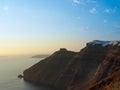 Santorini island with Firostefani Church against the sunset