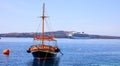 Santorini island, Greece - Boat and cruise ship near Nea Kameni island Royalty Free Stock Photo