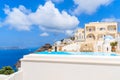 SANTORINI ISLAND, GREECE - MAY 22, 2016: A view of caldera with luxury hotel buildings, typical white architecture of Imerovigli Royalty Free Stock Photo