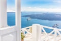 Santorini island, Greece. White gate with sea view. Famous travel destination, luxury greek resort. Royalty Free Stock Photo