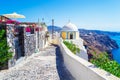 Santorini island narrow clifftop cobblestone lane Fira town Greece Royalty Free Stock Photo