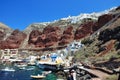 Port Amoudi is on the beach and in town. Oia, Santorini Island, Greece. Royalty Free Stock Photo
