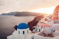 Santorini island Oia sunset landscape. Traditional white houses and church architecture with sea view. Travel to Greece Royalty Free Stock Photo