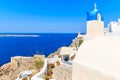 View of sea and Oia village with typical white church building, Santorini island, Greece Royalty Free Stock Photo