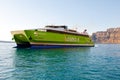 SANTORINI-JULY 28: Ferry arrives to the port of Thira on July 28, 2014, Santorini island, Greece.