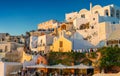 SANTORINI - JULY 11, 2014: People wait for sunset time in Oia to