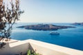 Santorini landscape of Aegean sea with big passenger cruise ship by volcano island. Caldera view. Tholos Naftilos Royalty Free Stock Photo