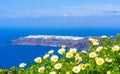 Santorini landscape - distant view of Oia across Aegean Sea