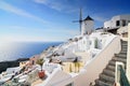 Santorini landscape with white houses and windmill, Oia Town, Santorini Island, Cyclades, Greece Royalty Free Stock Photo