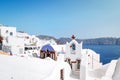 Santorini Oia Greece Europe, sunset at the white village of Oia Santorini with old blue and white Greek churches at dusk Royalty Free Stock Photo