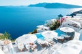 Santorini Oia village during sunset whit luxury hotels and whitewashed buildings in Santorini Island a luxury vacation