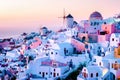 Santorini Oia village during sunset whit luxury hotels and whitewashed buildings in Santorini Island a luxury vacation