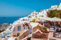 Santorini Oia village during sunset whit luxury hotels and whitewashed buildings in Santorini Island a luxury vacation