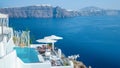 Santorini Oia village during sunset whit luxury hotels and whitewashed buildings in Santorini Island a luxury vacation