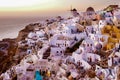 Santorini Oia village during sunset whit luxury hotels and whitewashed buildings in Santorini Island a luxury vacation