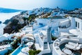 Santorini Oia village during sunset whit luxury hotels and whitewashed buildings in Santorini Island a luxury vacation