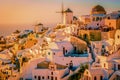 Santorini Oia village during sunset whit luxury hotels and whitewashed buildings in Santorini Island a luxury vacation