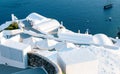 Santorini traditional white architecture, and blue sea Cyclades Greek islands, Greece