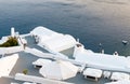 Santorini traditional white architecture, and blue sea Cyclades Greek islands, Greece