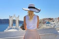Santorini Travel Vacation Tourist Looking At Caldera View and Aegean Sea Greece