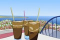 Cold coffee frappe on the background of the sea panorama