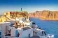 Santorini, view to Oia with woman in blue dress