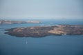 Santorini volcano, aerial shot of the caldera on a sunny day Royalty Free Stock Photo