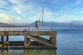 03-27-2019 SantoÃÂ±a, Cantabria, Spain. Bronze sculpture that reproduces a sulas fisherman small silver-colored fish made by the