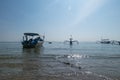 Sanur, Bali, Indonesia - February 7, 2021: Sanur beach in the morning. The activities of anglers and fishermen. Fishing boats Royalty Free Stock Photo
