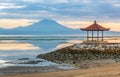 Sanur beach and Mount Agung volcano at sunrise, Bali, Indonesia Royalty Free Stock Photo