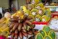 Typical Asian fruit market. Fresh tropical fruits are on the market window. Healthy, organic food