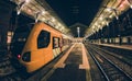 Sao Bento railway station platform with trains in Porto