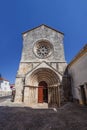 Sao Joao de Alporao Church, showing a Romanesque Portal and Gothic Wheel Window.