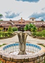 SAO JOSE DOS CAMPOS, SAO PAULO, BRAZIL - DECEMBER 27, 2018: Vicentina Aranha Park fountain with main building in the background, f Royalty Free Stock Photo