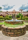 SAO JOSE DOS CAMPOS, SAO PAULO, BRAZIL - DECEMBER 27, 2018: Vicentina Aranha Park fountain with main building in the background, f Royalty Free Stock Photo