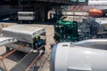 Petrobras Aviation tanker truck with fuel and workers loading luggage in the aircraft yard Royalty Free Stock Photo