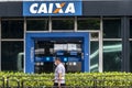 Building and logo of bank branch of Caixa Economica Federal CEF in Paulista Avenue. Is a