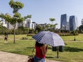 People enjoy for their leisure in the People's Park (Parque do Povo)