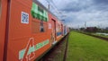 Train arrives at the embarkation and disembarkation platform of a station on the emerald line 9 of CPTM, the Sao Paulo Metropolita