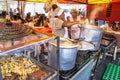 Woman prepares typical Bolivian foods