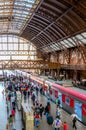 SAO PAULO , BRAZIL . Moving inside the Luz Station, trains and passengers at the boarding and landing platforms, in