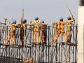 Workers in the construction of the elevated metro track, Line 17 gold