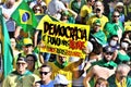 A man holds a sign that reads: `Democracy is the people in the streets # we are all Bolsonaro` Royalty Free Stock Photo