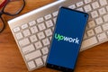 Sao Paulo, Brazil - March 23, 2020: Upwork logo is displayed on a smartphone. Global freelance platform where companies and indepe