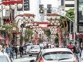 Pedestrian and vehicle movement at Galvao Bueno street in the Liberdade district