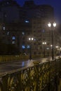 Blured of rainy night view of the iron grid of the Santa Ifigenia viaduct