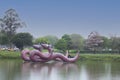 Sao Paulo, Brazil - October, 2021: Two inflatable snakes 10 meters high floating in the lagoon of Ibirapuera Park